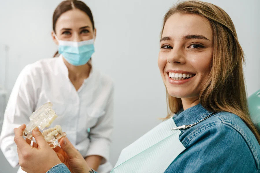 Smiling teenager in Aspen Orthodontist office with Invisalign